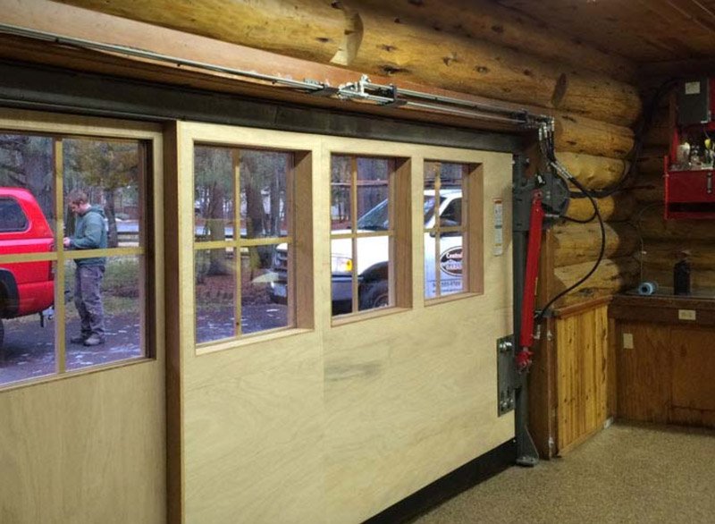 Interior of custom wooden hydraulic garage door 