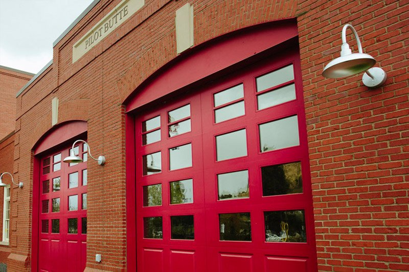 Pilot Butte Fire Station red carriage house door 