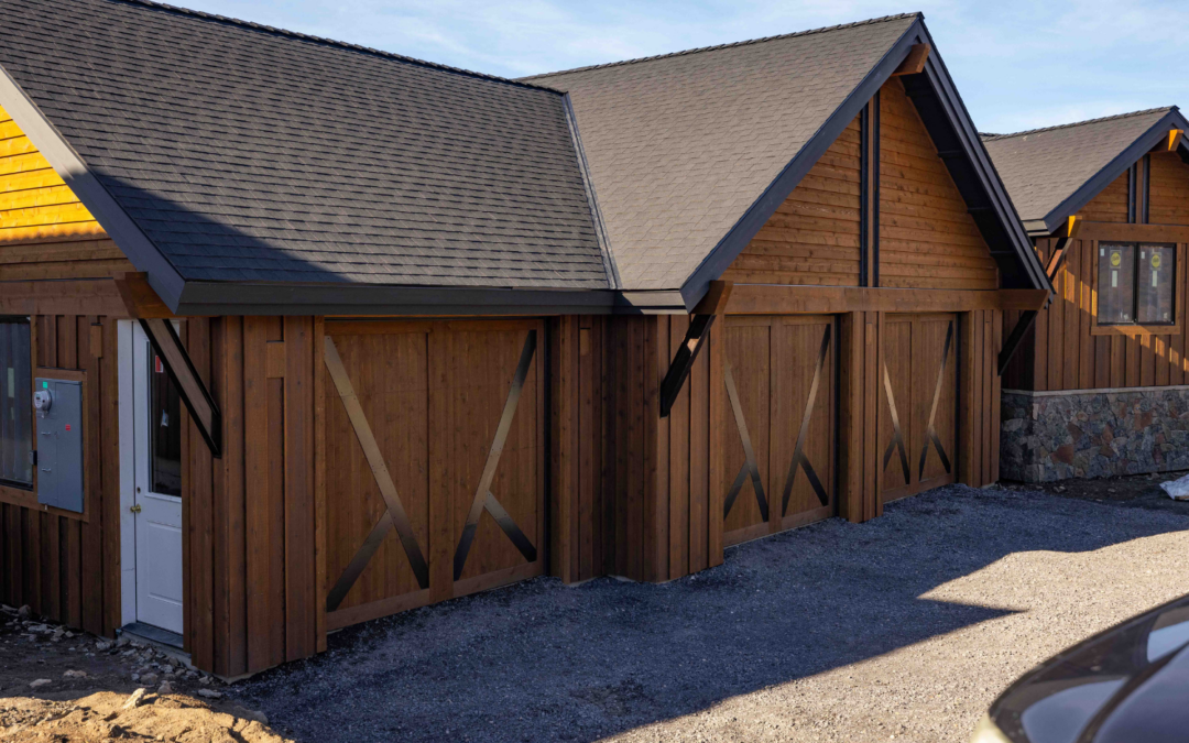 custom wood garage door with rolled steel accents