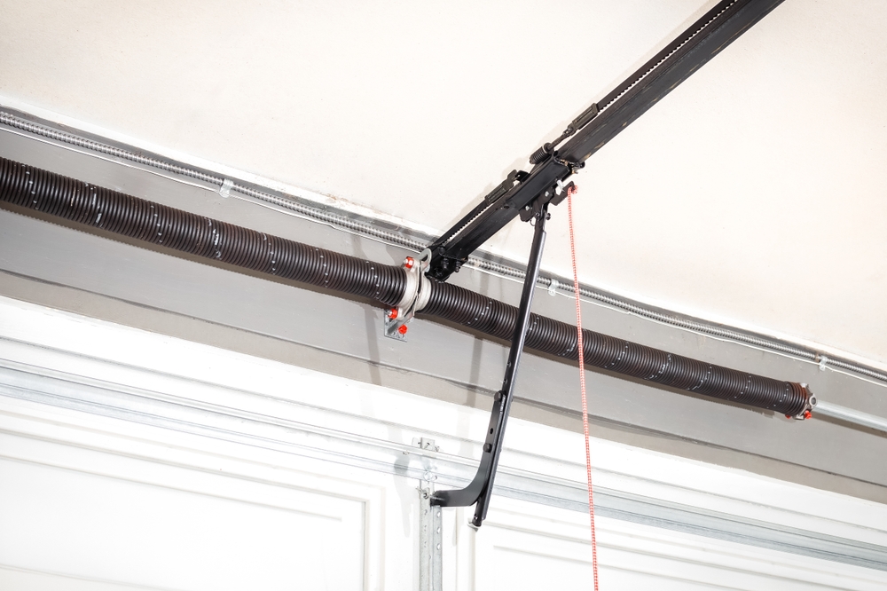 10 Signs You Need a Garage Door Spring Replacement (And What to Do Next)