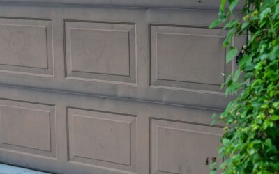 Garage Door Panel Replacement: Repair, Replace, or New Door?